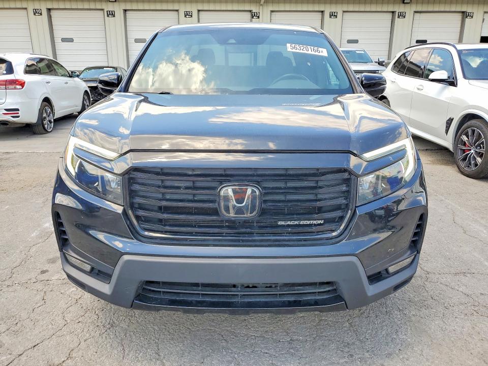 2021 Honda Ridgeline VIN 5FPYK3F83MB012458 COPART salvage auction — MINOR DENT/SCRATCHES, Fl - Certificate Of Title, sold $12,100 on 2026-07-30 (photo 5)