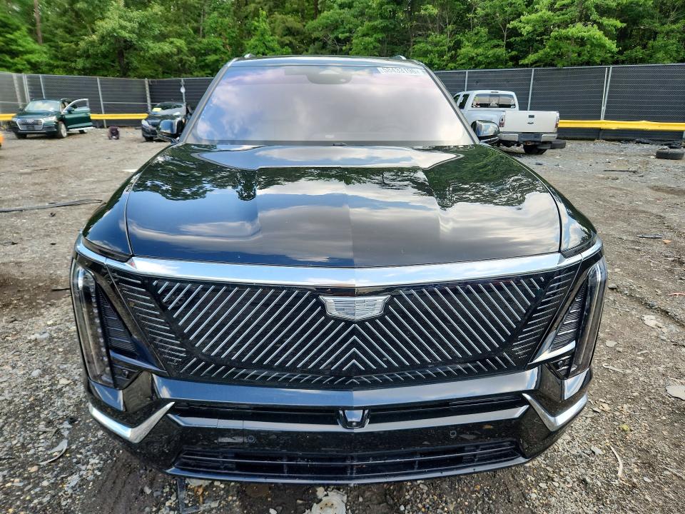 2026 Cadillac Xt4 VIN 1GYC3KML8TZ701349 COPART salvage auction — SIDE, Id - Salvage Certificate Of Title, sold $25,750 on 2026-08-14 (photo 5)