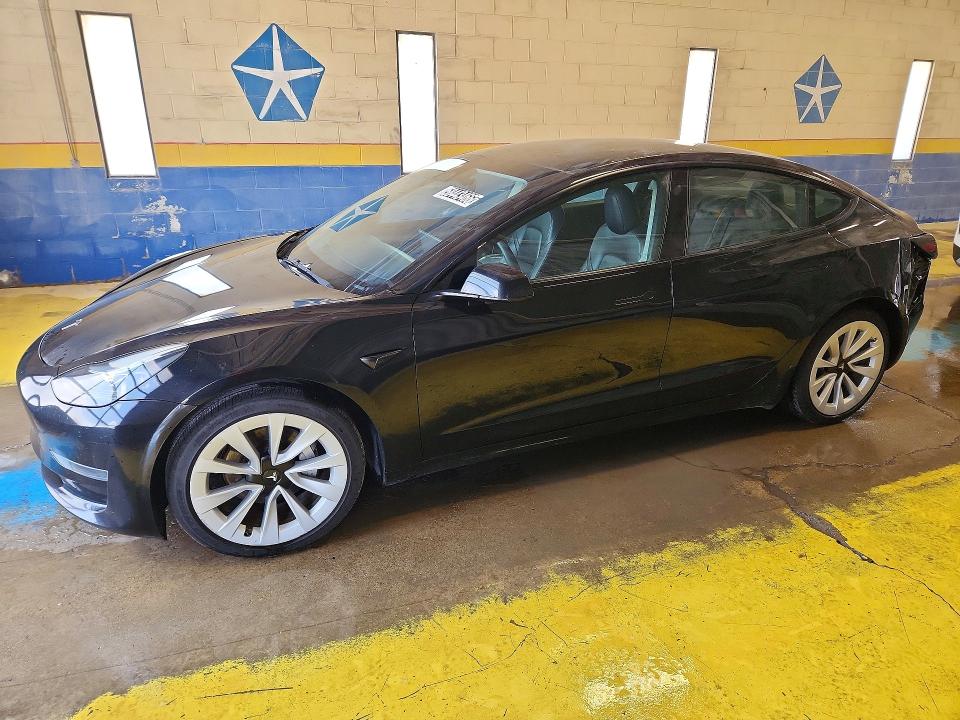 2023 Tesla Model 3 VIN 5YJ3E1EA7PF437527 COPART salvage auction — REAR END, In - Certificate Of Title, sold $9,200 on 2026-07-06 (photo 1)