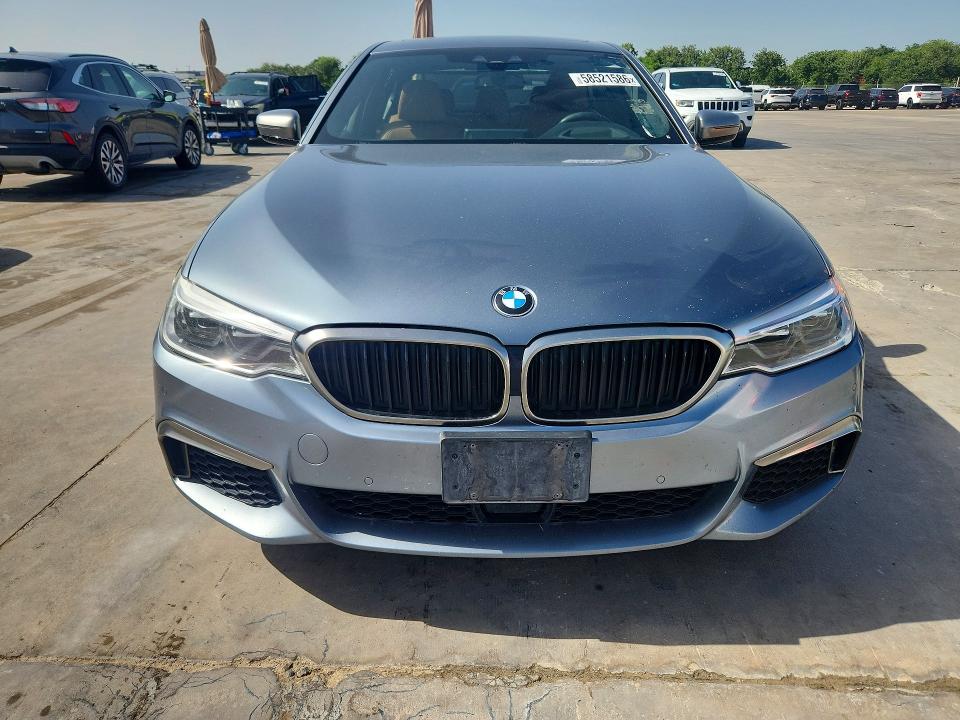 2018 BMW M5 VIN WBAJB9C5XJB035786 COPART salvage auction — NORMAL WEAR, Tx - Certificate Of Title, sold $12,800 on 2026-07-27 (photo 5)