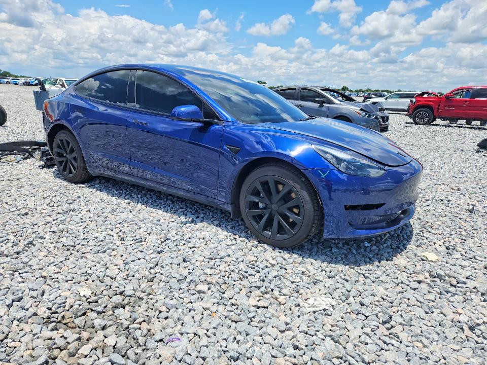 2023 Tesla Model 3 VIN 5YJ3E1EA2PF581664 COPART salvage auction — REAR END, Salvage Title, sold $9,700 on 2026-07-17 (photo 4)