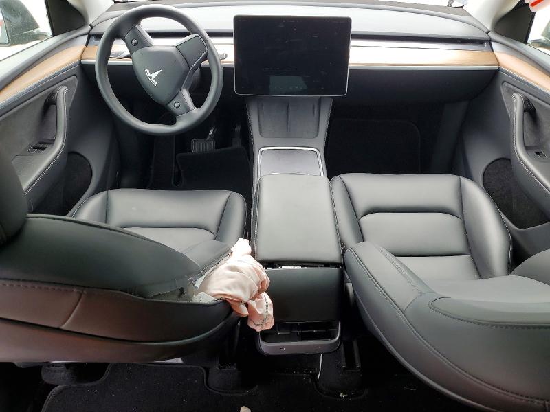 2025 Tesla Model y VIN 7SAYGDEE9SA353397 COPART salvage auction — FRONT END, TX - SALVAGE VEHICLE TITLE (P), sold $14,000 on 2026-07-17 (photo 8)