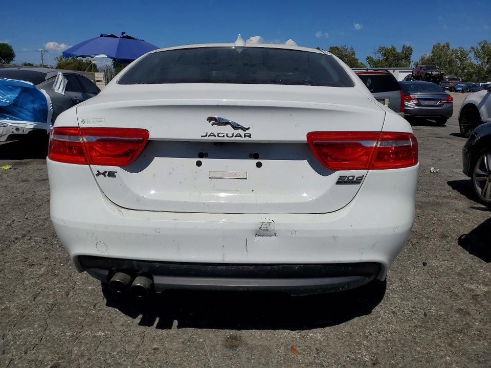2017 Jaguar Xe VIN SAJAK4BN3HA953940 COPART salvage auction — MINOR DENT/SCRATCHES, Fl - Dis/Dlr/Exp Only Clean Title, sold $425 on 2026-07-02 (photo 6)