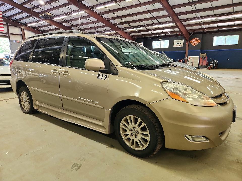 2007 Toyota Sienna VIN 5TDZK22C47S030467 COPART salvage auction — MINOR DENT/SCRATCHES, NH - CERT OF TITLE-REBUILT VEHICLE, sold $2,900 on 2026-07-27 (photo 4)