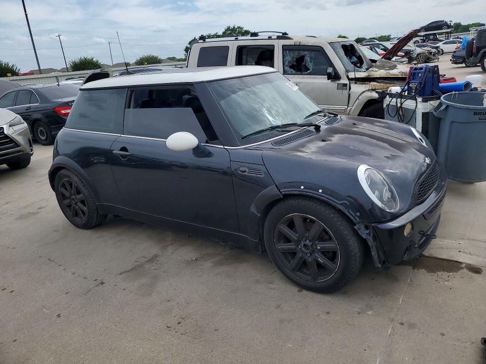2005 Mini Cooper VIN WMWRC33455TJ64829 COPART salvage auction — FRONT END, TX - SALVAGE VEHICLE TITLE, sold $325 on 2026-07-09 (photo 4)