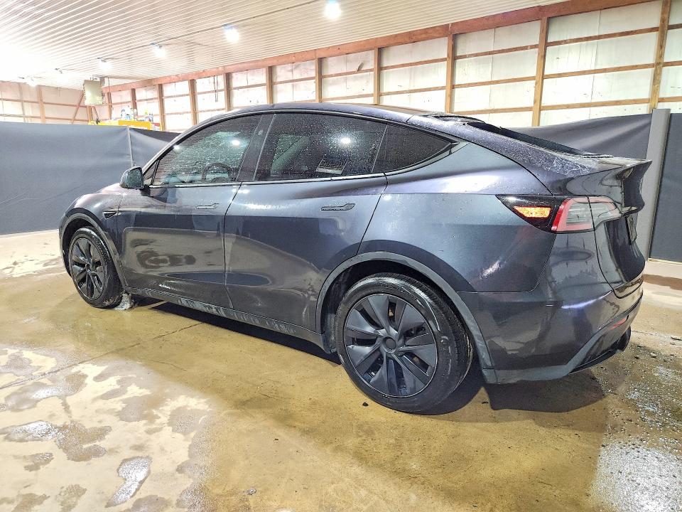 2025 Tesla Model y VIN 7SAYGDEE7SF289184 COPART salvage auction — HAIL, Oh - Certificate Of Title, sold $18,000 on 2026-07-09 (photo 2)