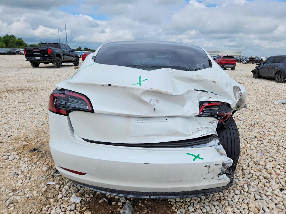 2023 Tesla VIN 5YJ3E1EC8PF503097 COPART salvage auction — REAR END, Tx - Salvage Vehicle Title, sold $2,500 on 2026-07-30 (photo 6)