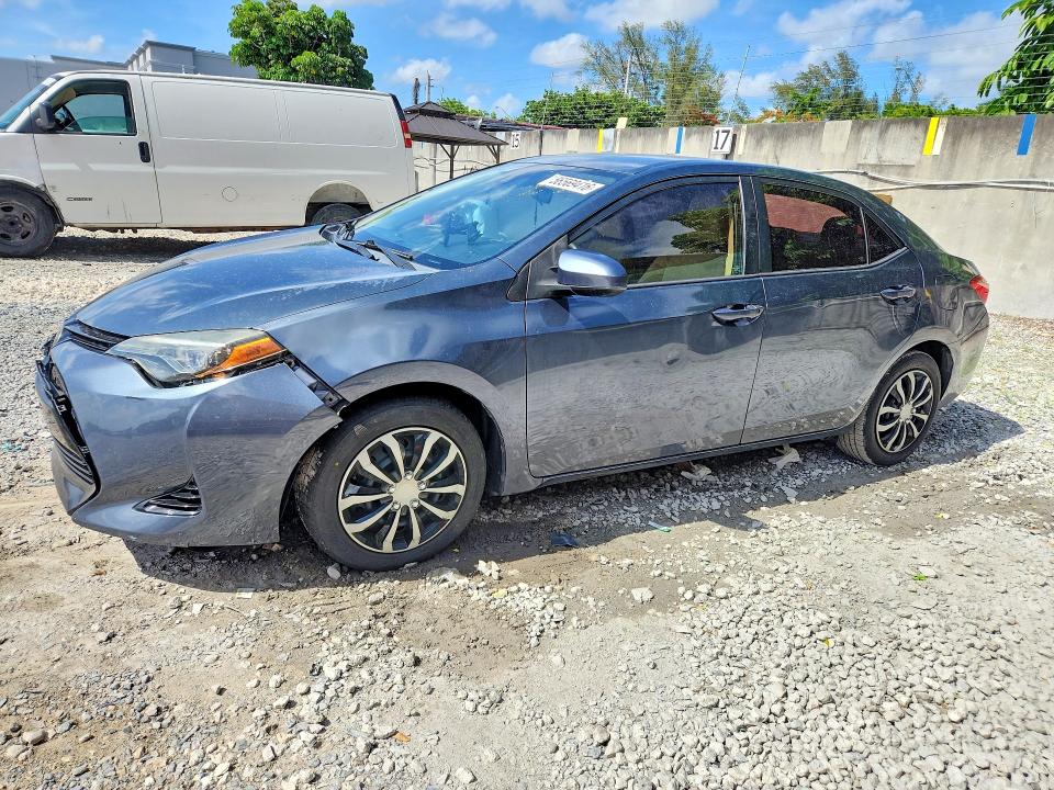 2017 Toyota Corolla VIN 5YFBURHE9HP703339 COPART salvage auction — SIDE, Fl - Cert Of Title Slvg Rebuildable, sold $3,750 on 2026-07-10 (photo 1)