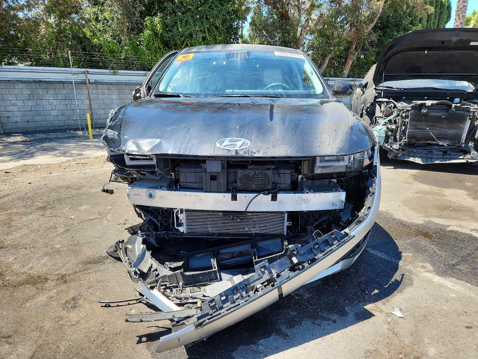 2023 Hyundai Ioniq 5 VIN KM8KNDAF6PU228636 COPART salvage auction — UNDERCARRIAGE, Ca - Non-Repairable Vehicle Cert, sold $4,250 on 2026-07-20 (photo 5)