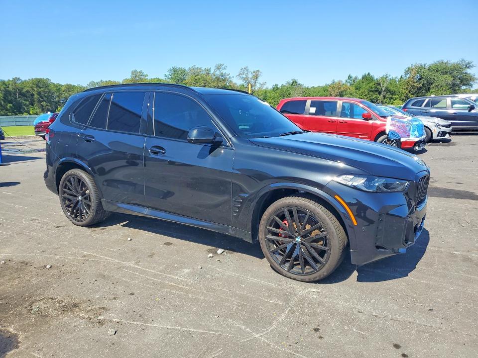2024 BMW VIN 5UX23EU01R9V38057 COPART salvage auction — MECHANICAL, Fl - Cert Of Title Slvg Rebuildable, sold $36,000 on 2026-07-22 (photo 4)