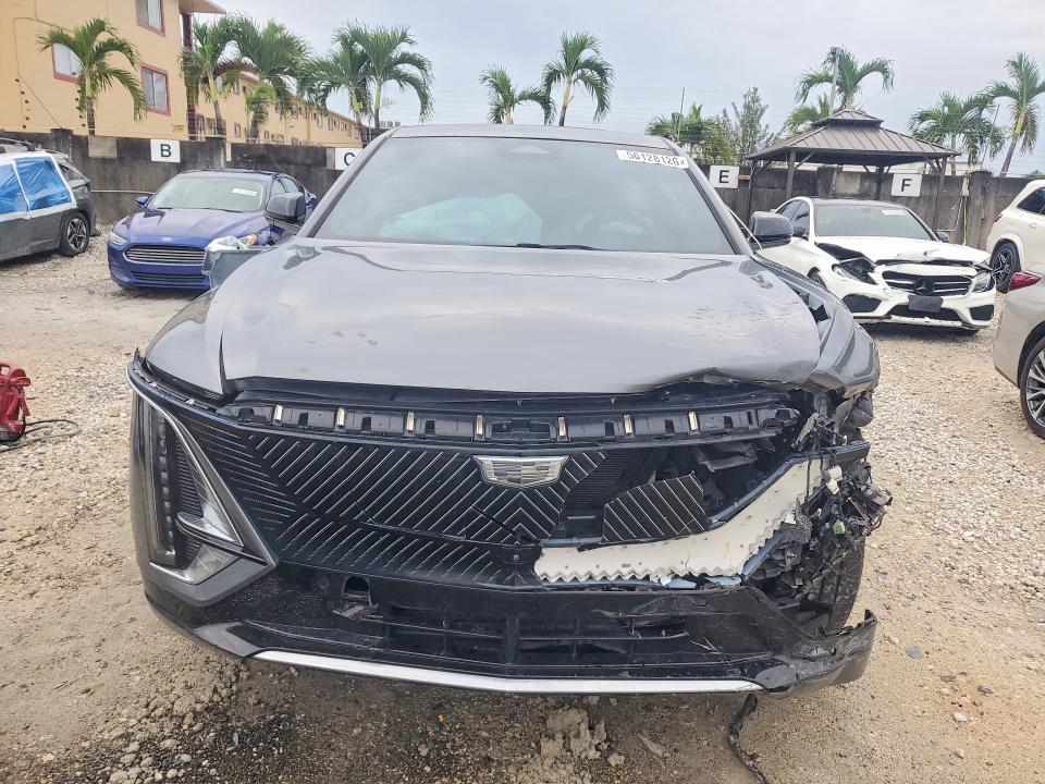 2023 Cadillac Lyriq VIN 1GYKPMRK1PZ000945 COPART salvage auction — FRONT END, Fl - Cert Of Title Slvg Rebuildable, sold $15 on 2026-07-31 (photo 5)
