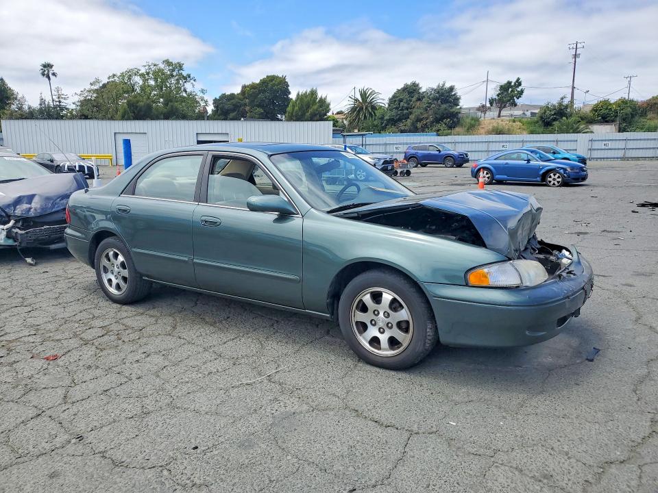 1999 Mazda 626 VIN 1YVGF22C3X5853466 COPART salvage auction — FRONT END, CA - SALVAGE CERTIFICATE, sold $100 on 2026-07-02 (photo 4)