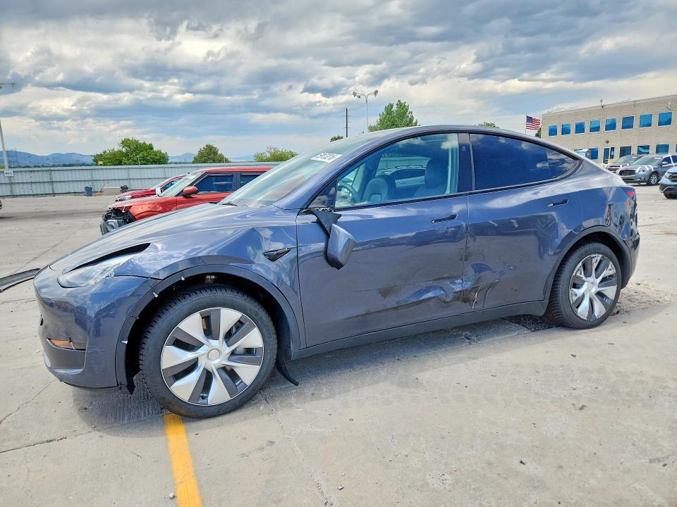 2023 Tesla Model y VIN 7SAYGDEE8PF935484 COPART salvage auction — SIDE, Co - Public - Salvage Title, sold $11,300 on 2026-09-04 (photo 1)