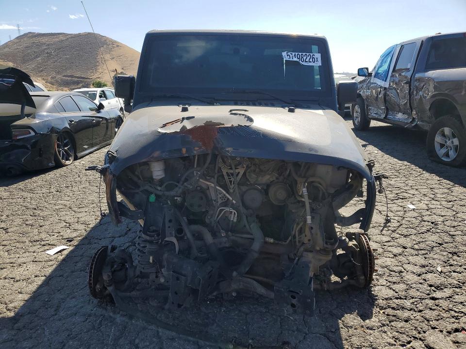 2017 Jeep Wrangler / VIN 1C4BJWDG2HL669557 COPART salvage auction — FRONT END, Ca - Dis/Dlr/Exp Only Clean Title, sold $2,700 on 2026-08-10 (photo 5)