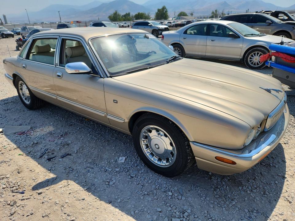 2000 Jaguar Vandenplas VIN SAJDA24C6YLF03755 COPART salvage auction — MECHANICAL, Ut - Certificate Of Title, sold $150 on 2026-07-02 (photo 4)