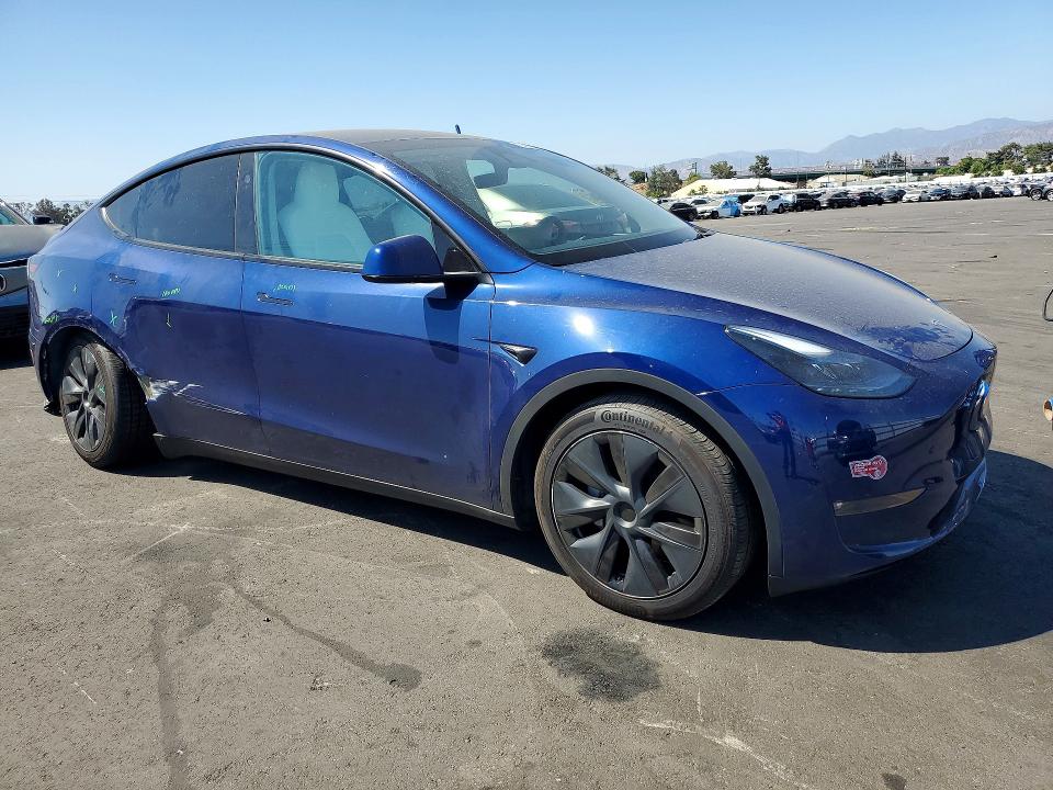 2024 Tesla Model y VIN 7SAYGAEE7RF184296 COPART salvage auction — REAR END, CA - SALVAGE CERTIFICATE, sold $13,500 on 2026-07-20 (photo 4)