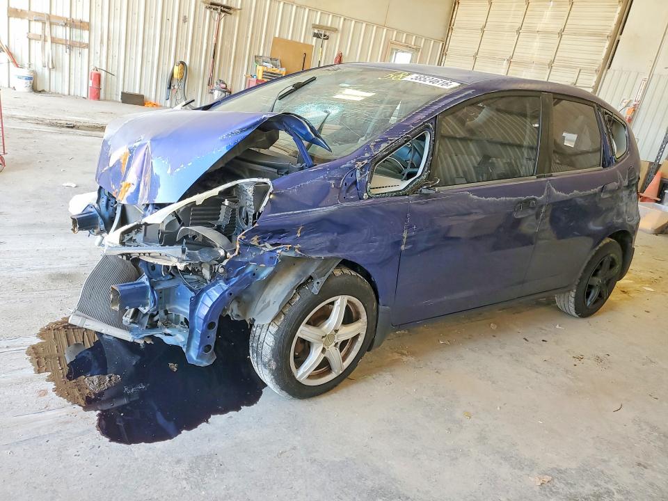 2009 Honda Fit VIN JHMGE88269S058702 COPART salvage auction — FRONT END, Tx - Nonrepairable Title, sold $60 on 2026-07-17 (photo 1)