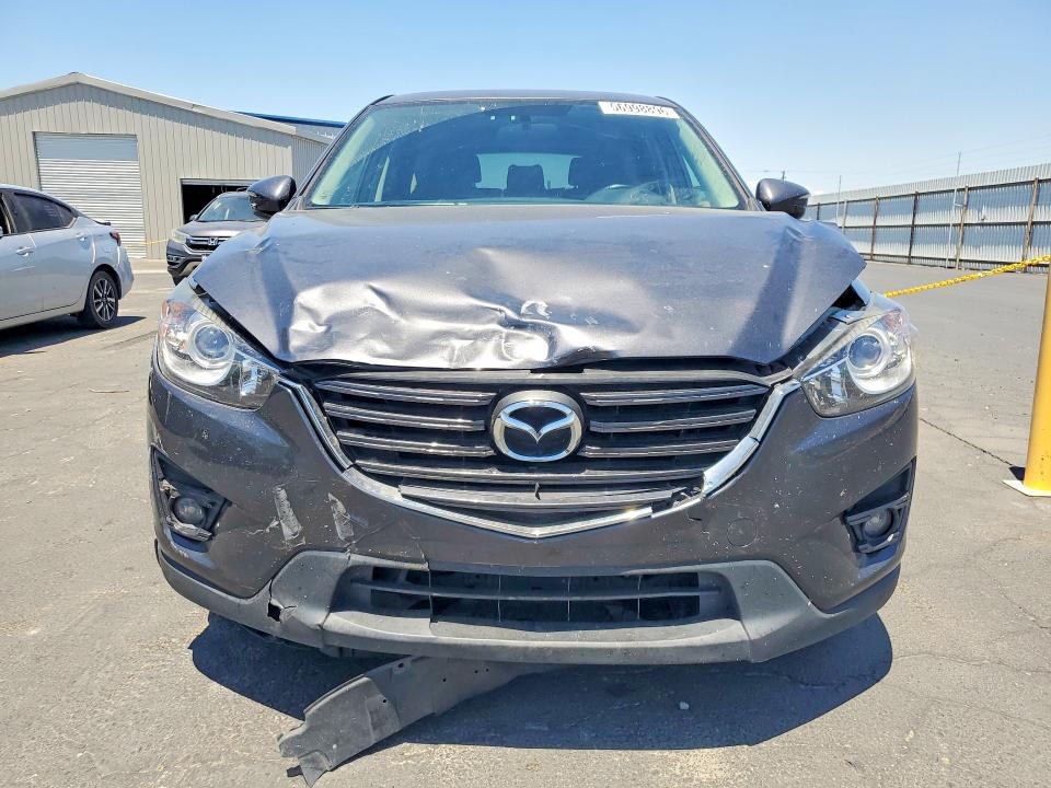 2016 Mazda VIN JM3KE4CY0G0885367 COPART salvage auction — FRONT END, CA - SALVAGE CERTIFICATE, sold $125 on 2026-07-27 (photo 5)