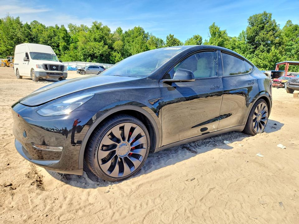 2024 Tesla Model y VIN 7SAYGDEF8RF039777 COPART salvage auction — SIDE, FL - CERT OF TITLE SLVG REBUILDABLE, sold $12,100 on 2026-07-24 (photo 1)