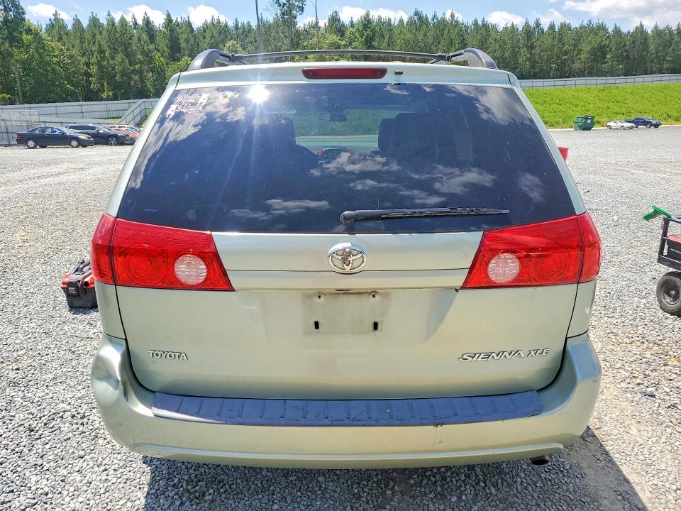 2010 Toyota Sienna VIN 5TDYK4CC8AS306663 COPART salvage auction — REAR END, NC - SALVAGE CERTIFICATE OF TITLE, sold $550 on 2026-07-30 (photo 6)