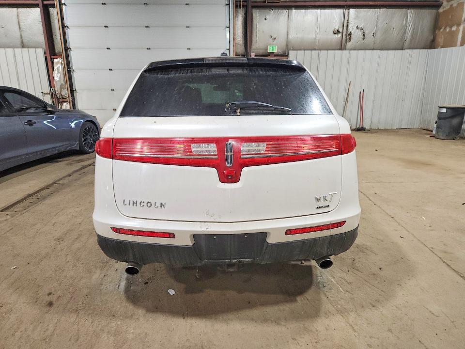2013 Lincoln Mkt VIN 2LMHJ5AT2DBL57058 COPART salvage auction — MECHANICAL, Ak - Certificate Of Vehicle Title, sold $25 on 2026-07-21 (photo 6)