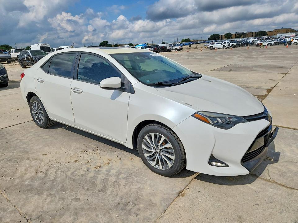 2017 Toyota Corolla VIN 5YFBURHE5HP581577 COPART salvage auction — SIDE, TX - CERTIFICATE OF TITLE, sold $3,850 on 2026-07-27 (photo 4)