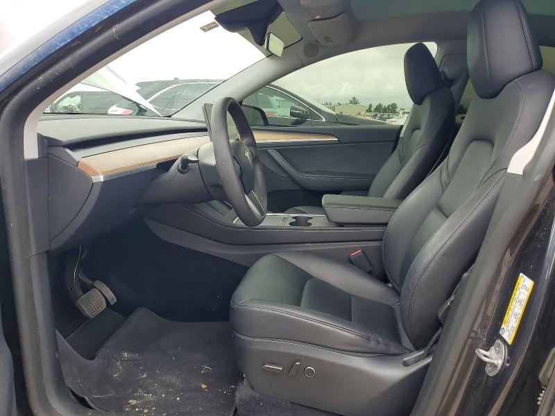 2025 Tesla Model y VIN 7SAYGDED1SA343504 COPART salvage auction — REAR END, TX - SALVAGE VEHICLE TITLE, sold $13,100 on 2026-07-10 (photo 7)