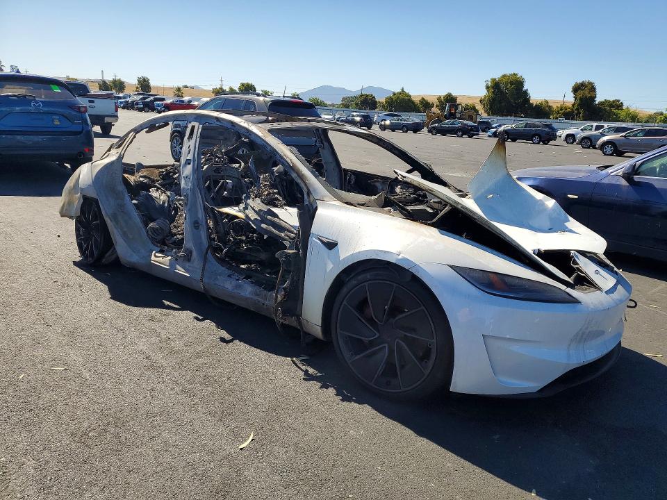 2025 Tesla Model 3 VIN 5YJ3E1ET1SF966501 COPART salvage auction — BURN, CA - NON-REPAIRABLE VEHICLE CERT, sold $150 on 2026-07-20 (photo 4)