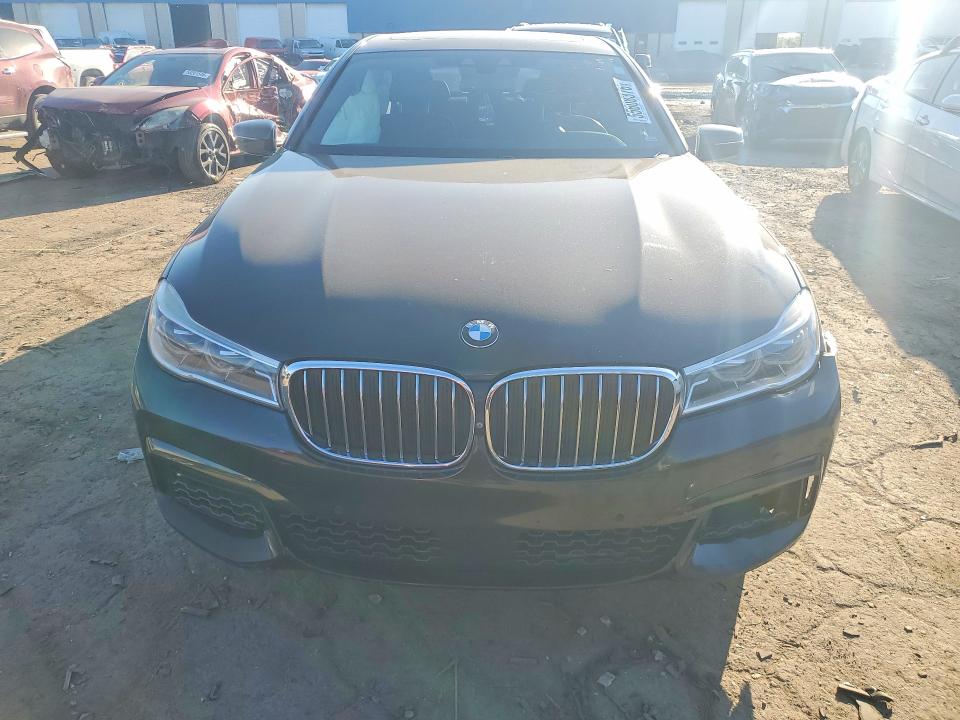 2016 BMW 7er VIN WBA7F2C59GG419706 COPART salvage auction — SIDE, Mi - Certificate Of Title, sold $2,000 on 2026-07-28 (photo 5)