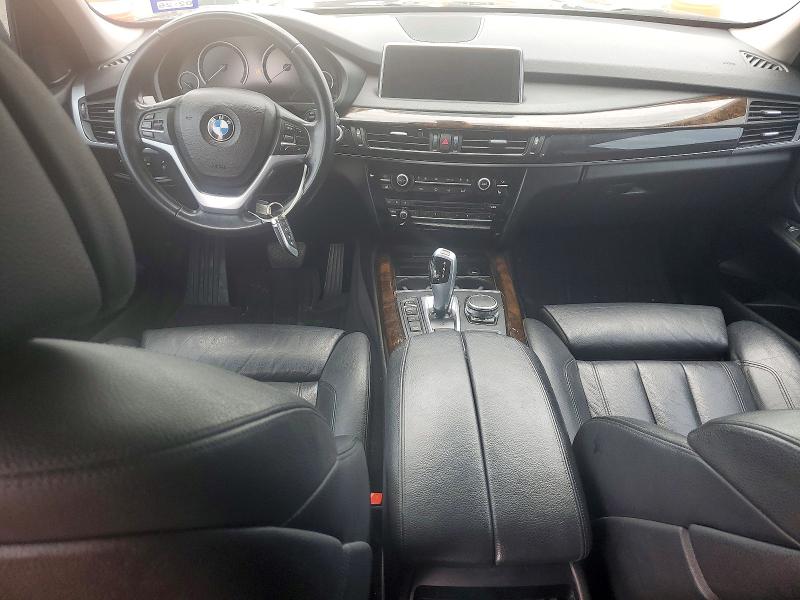 2015 BMW VIN 5UXKR0C59F0K69630 COPART salvage auction — MINOR DENT/SCRATCHES, Tx - Certificate Of Title (P), sold $1,100 on 2026-07-09 (photo 8)