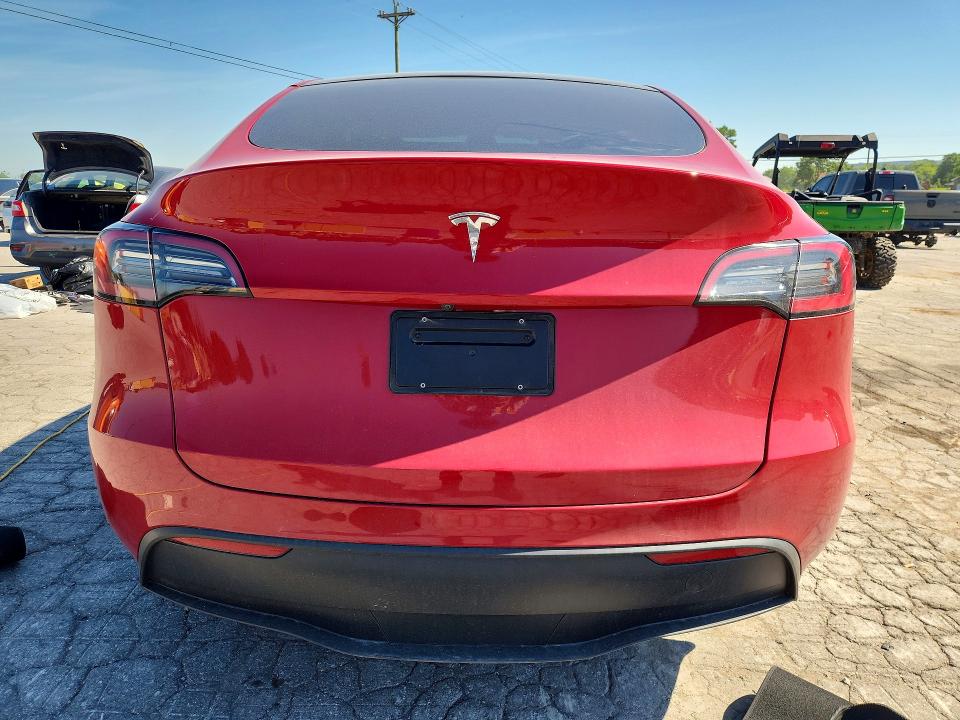 2023 Tesla Model y VIN 7SAYGDEE8PA056449 COPART salvage auction — SIDE, Tn - Salvage Certificate, sold $11,000 on 2026-07-06 (photo 6)