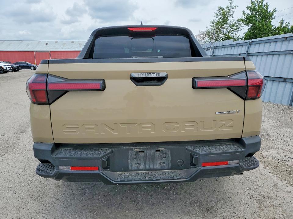 2023 Hyundai Santa cruz VIN 5NTJEDAF3PH047859 COPART salvage auction — NORMAL WEAR, On - Permit No Brand - Unfit (P), sold $22,200 on 2026-07-08 (photo 6)