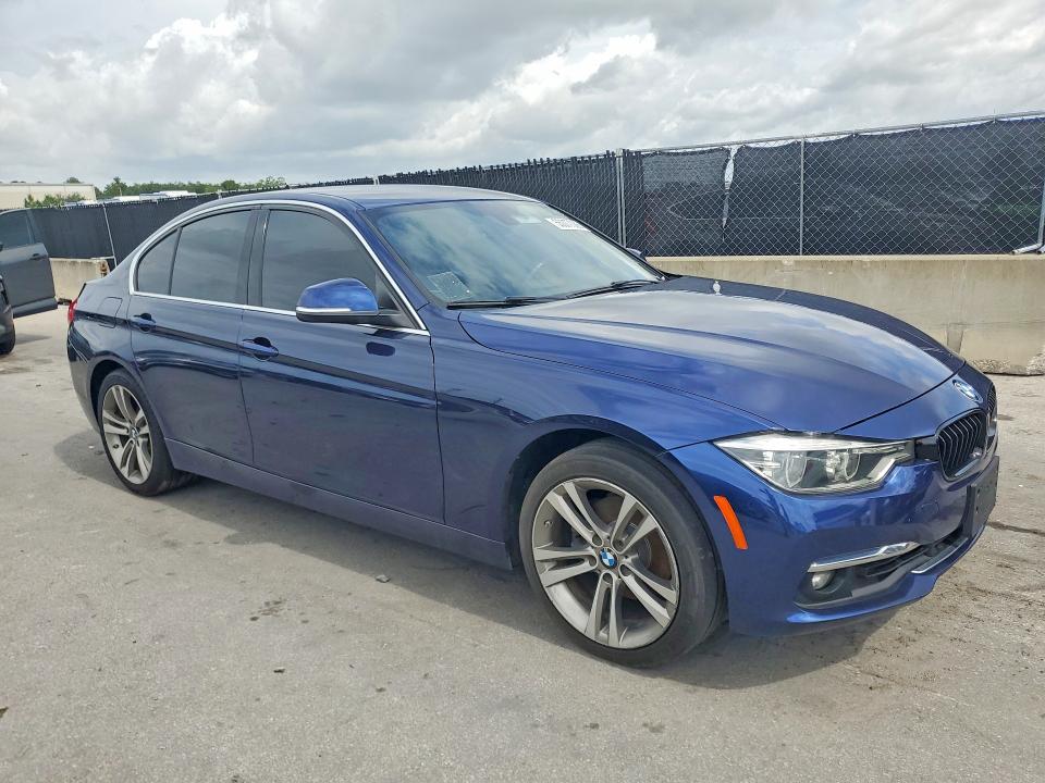 2018 BMW 3 series VIN WBA8B9C55JEE81053 COPART salvage auction — REAR END, Fl - Certificate Of Title, sold $5,700 on 2026-07-07 (photo 4)