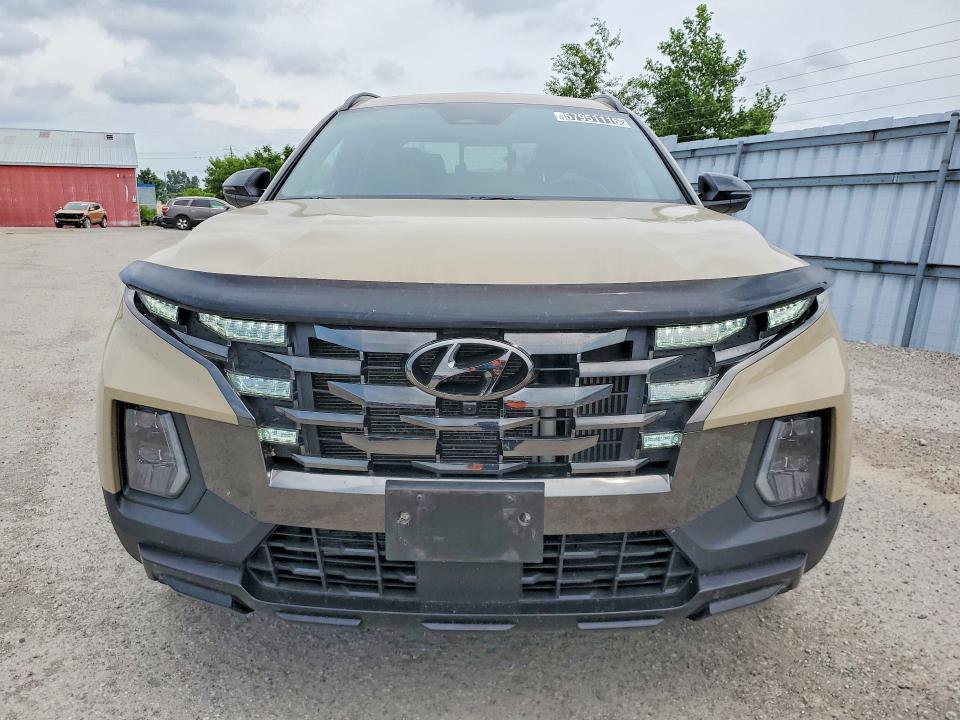 2023 Hyundai Santa cruz VIN 5NTJEDAF3PH047859 COPART salvage auction — NORMAL WEAR, On - Permit No Brand - Unfit (P), sold $22,200 on 2026-07-08 (photo 5)