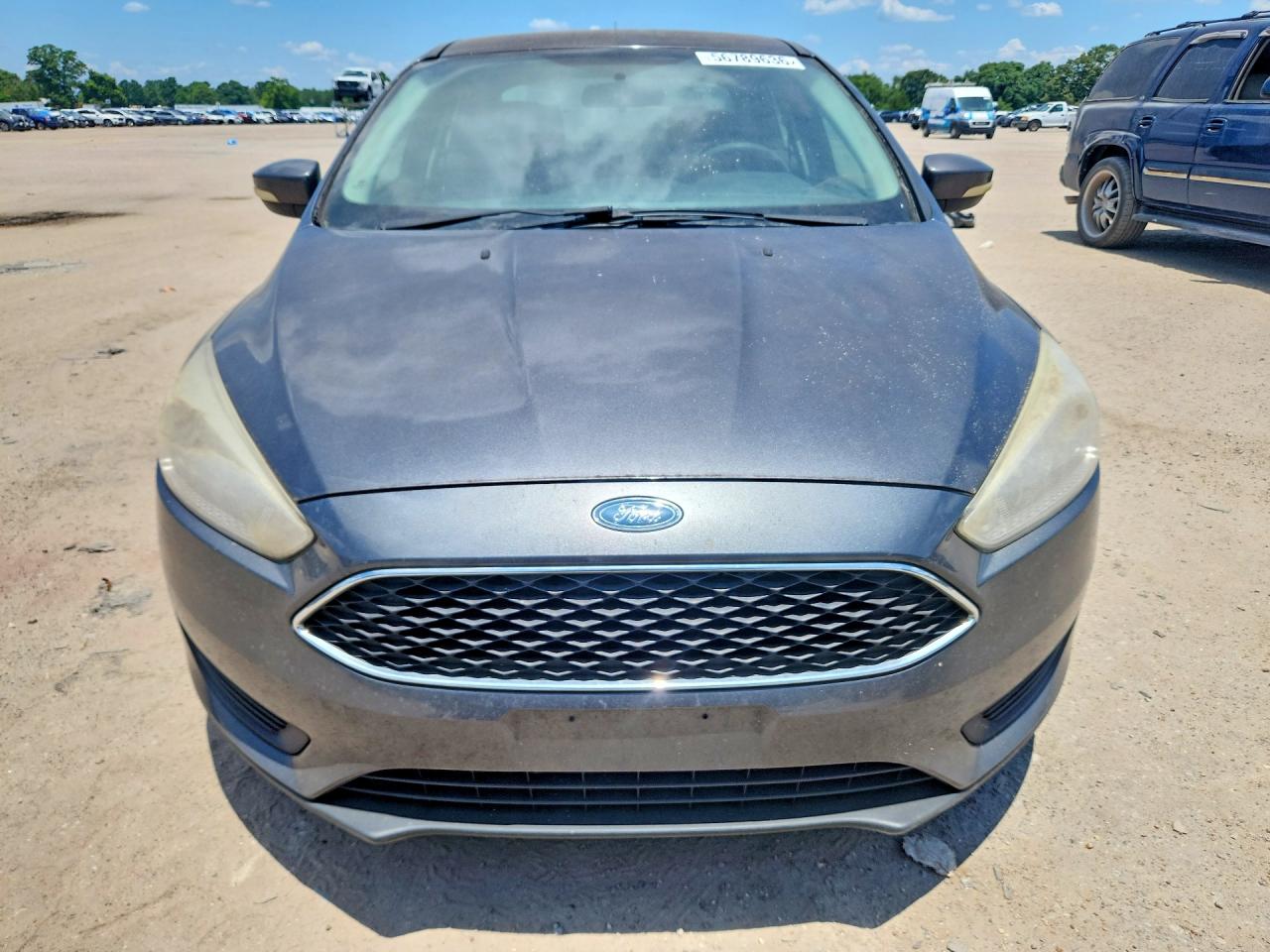 2017 Ford Focus VIN 1FADP3F23HL297806 COPART salvage auction — Mechanical, AL - CERTIFICATE OF TITLE, sold $450 on 2026-07-09 (photo 5)
