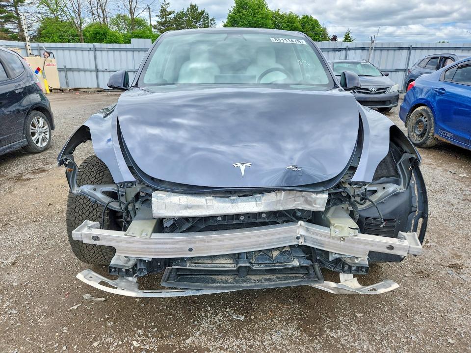 2023 Tesla Model y VIN 7SAYGDEE2PF607607 COPART salvage auction — FRONT END, On - Permit Salvage, sold $12,700 on 2026-07-16 (photo 5)