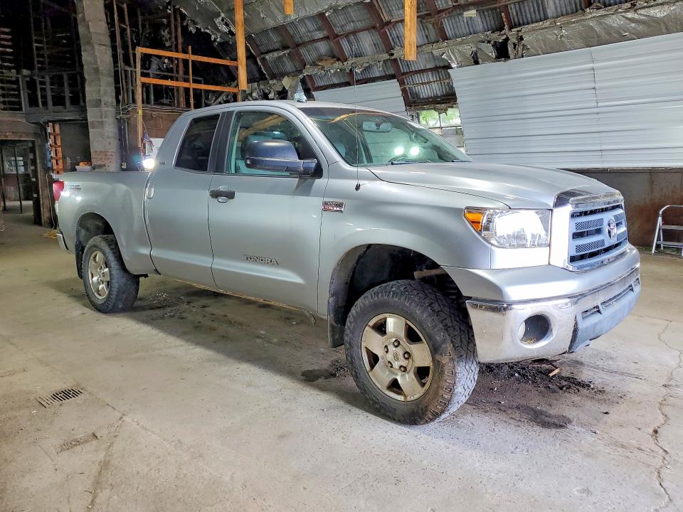 2010 Toyota Tundra VIN 5TFUY5F19AX106057 COPART salvage auction — MINOR DENT/SCRATCHES, Fl - Certificate Of Title, sold $3,200 on 2026-07-27 (photo 4)