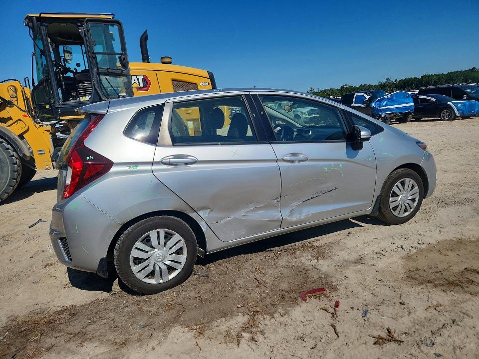 2016 Honda Fit VIN JHMGK5H55GX036739 COPART salvage auction — SIDE, Fl - Cert Of Title Slvg Rebuildable, sold $2,900 on 2026-07-10 (photo 3)