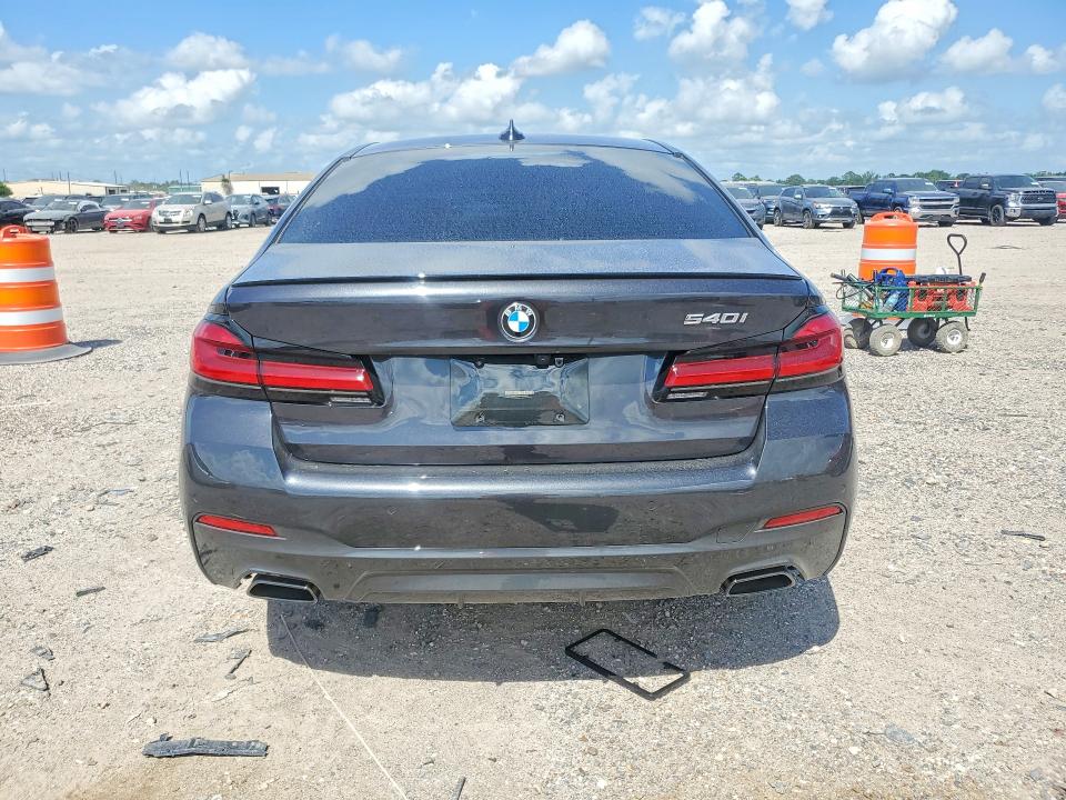 2023 BMW 5er VIN WBA53BJ04PWY03101 COPART salvage auction — WATER/FLOOD, TX - SALVAGE TITLE-FLOOD DAMAGE, sold $15,700 on 2026-07-30 (photo 6)
