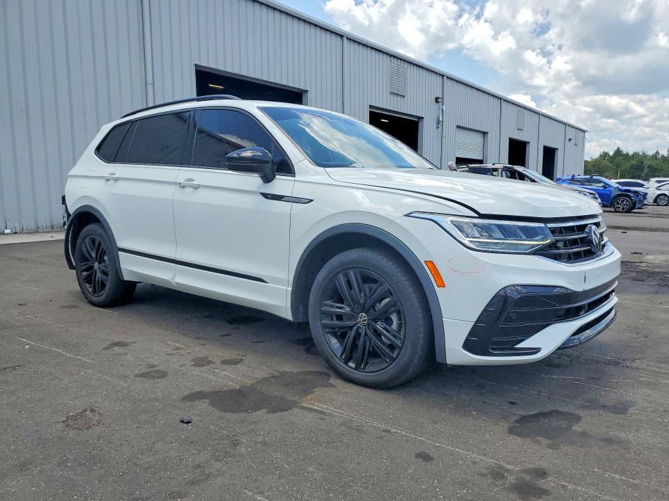 2022 Volkswagen Tiguan VIN 3VVCB7AX9NM040739 COPART salvage auction — REAR END, Fl - Cert Of Title Slvg Rebuildable, sold $13,100 on 2026-08-24 (photo 4)