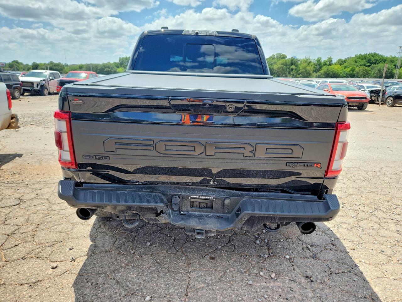 2023 Ford F-150 Lightning VIN 1FTFW1RJ4PFC92687 COPART salvage auction — Rear End, OK - CERT OF TITLE-SALVAGE, sold $76,000 on 2026-07-08 (photo 6)