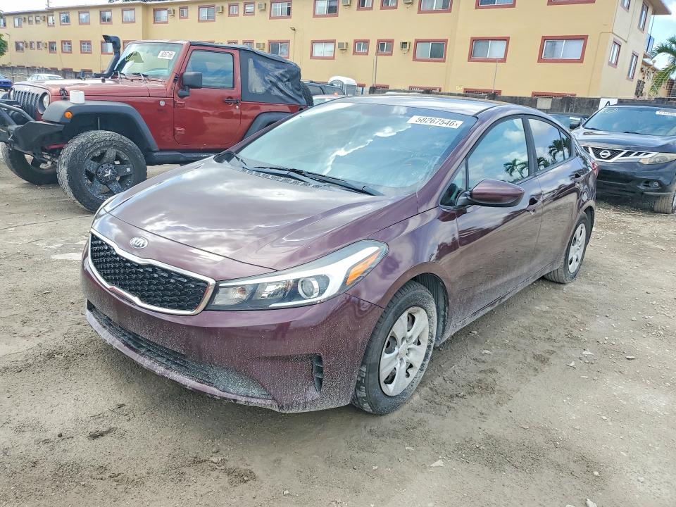 2018 Kia Forte VIN 3KPFK4A71JE196692 COPART salvage auction — SIDE, Fl - Cert Of Title Slvg Rebuildable (P), sold $1,150 on 2026-07-09 (photo 1)