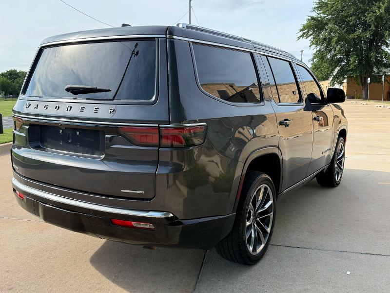 2022 Jeep Grand wagoneer VIN 1C4SJVDT7NS127735 COPART salvage auction — MINOR DENT/SCRATCHES, Ok - Cert Of Title-Repossession (P), sold $14,100 on 2026-07-21 (photo 4)