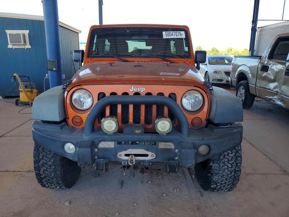 2011 Jeep Wrangler / VIN 1J4BA6H10BL505795 COPART salvage auction — ENGINE BURN, Az - Cert Of Title - Salvage, sold $4,950 on 2026-07-02 (photo 5)