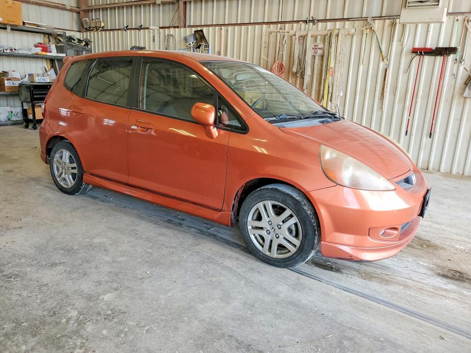 2007 Honda Fit VIN JHMGD38687S068539 COPART salvage auction — WATER/FLOOD, Tx - Salvage Title-Flood Damage, sold $550 on 2026-07-17 (photo 4)