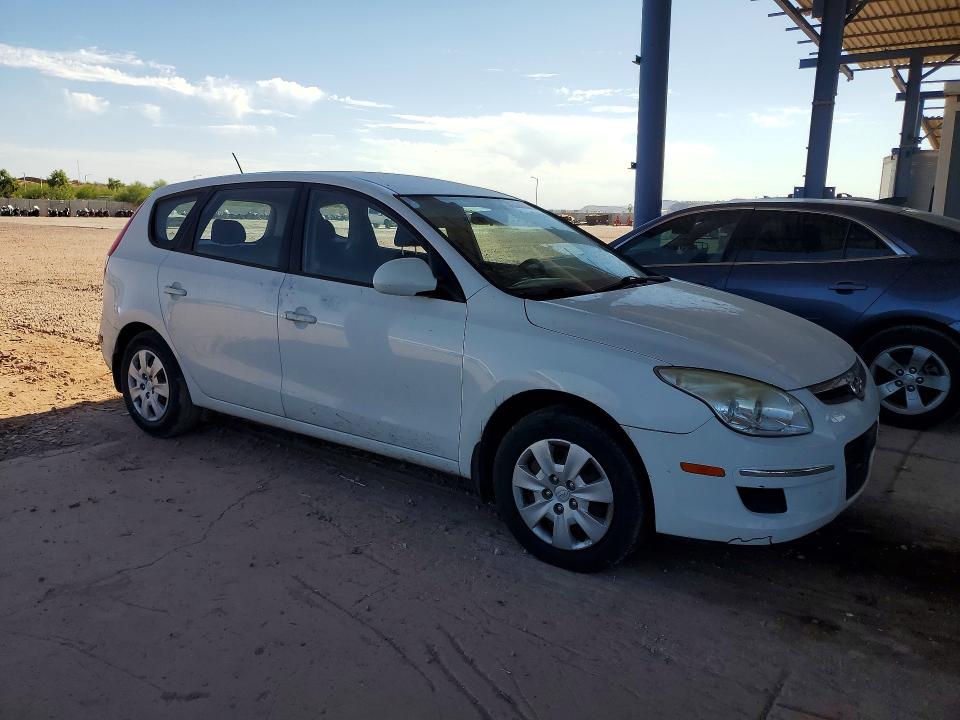 2011 Hyundai Elantra VIN KMHDB8AE8BU086993 COPART salvage auction — NORMAL WEAR, Az - Cert Of Title - Salvage, sold $625 on 2026-07-07 (photo 4)