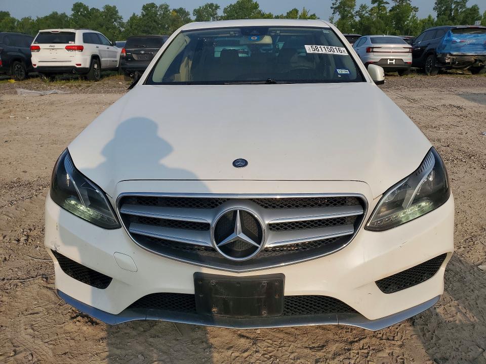 2014 Mercedes-benz E-klasse VIN WDDHF5KB0EA980804 COPART salvage auction — SIDE, TX - SALVAGE VEHICLE TITLE (P), sold $3,150 on 2026-07-17 (photo 5)