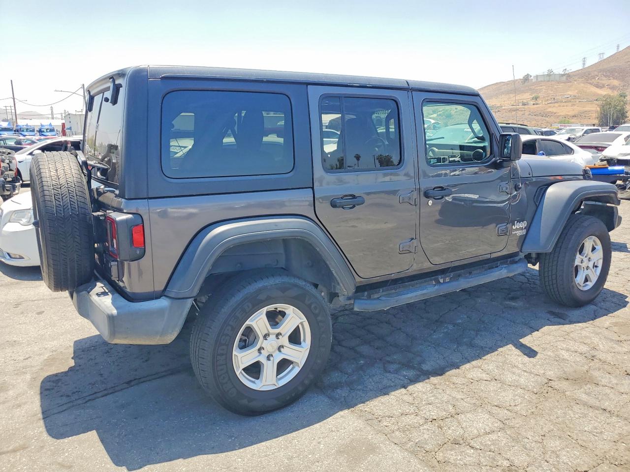 2018 Jeep Wrangler Unlimited VIN 1C4HJXDNXJW145348 COPART salvage auction — Minor Dent/Scratches, FL - DERELICT VEHICLE CERTIFICATE, sold $9,900 on 2026-07-02 (photo 3)