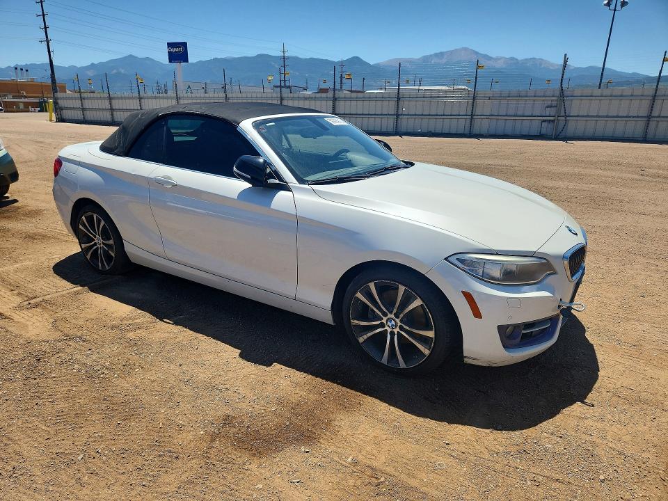 2015 BMW 2er VIN WBA1K7C55FV235128 COPART salvage auction — MINOR DENT/SCRATCHES, Co - Dis/Dlr/Exp Only Clean Title, sold $3,450 on 2026-07-13 (photo 4)