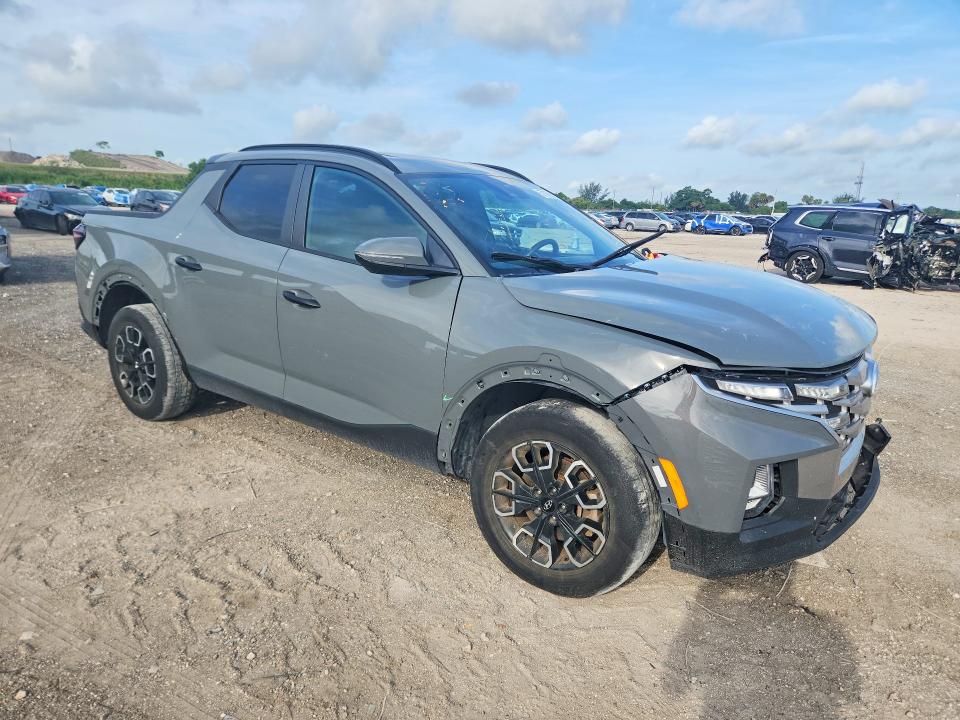 2023 Hyundai Santa cruz VIN 5NTJCDAE5PH060884 COPART salvage auction — FRONT END, Fl - Cert Of Title Slvg Rebuildable, sold $6,400 on 2026-07-14 (photo 4)